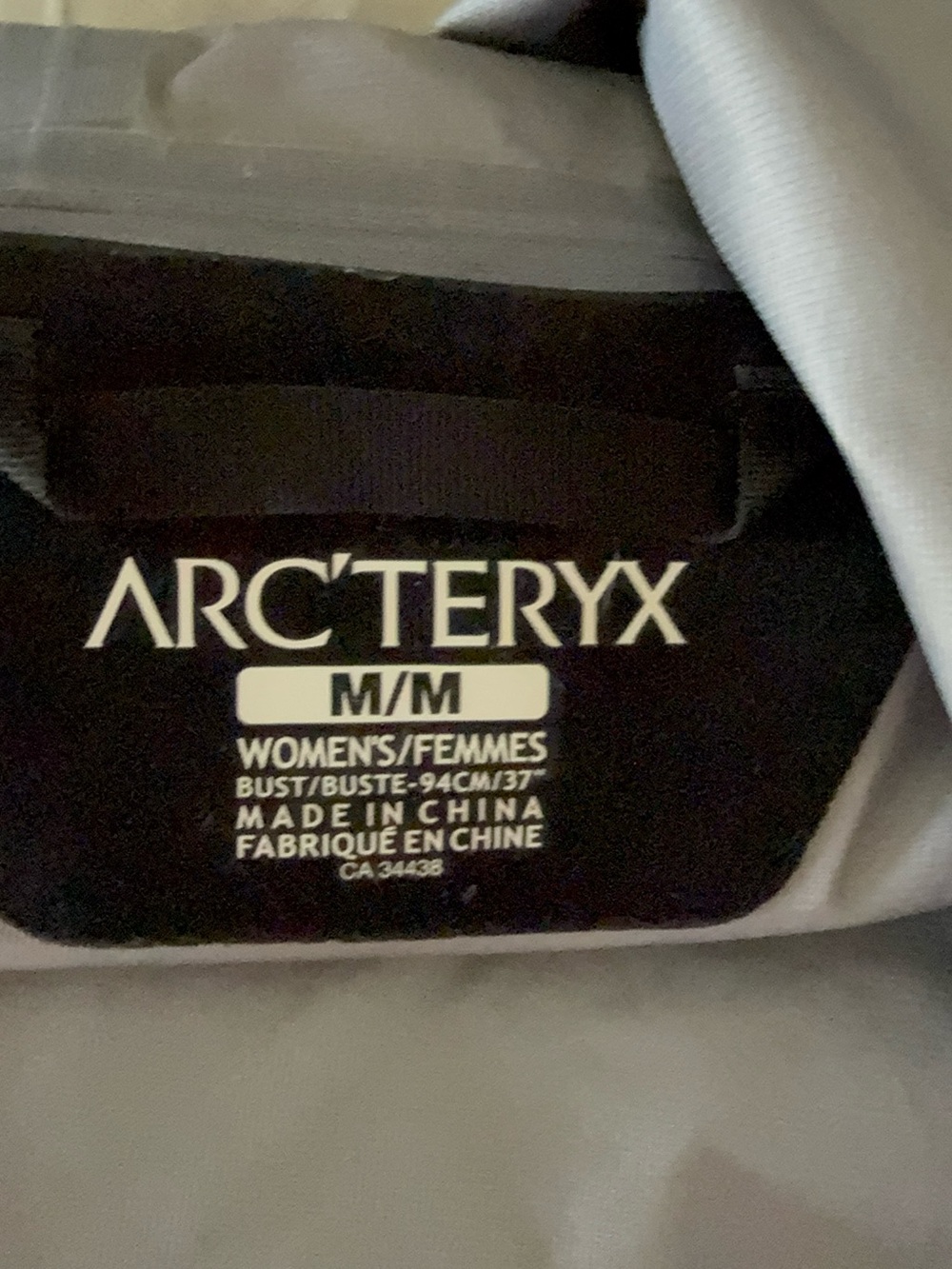 Arc'teryx Women's Hooded Raincoat in Light Beige - Picture 9 of 11